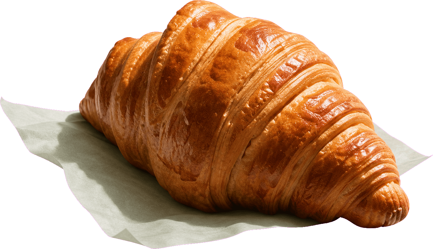Buttery croissant on a sage napkin